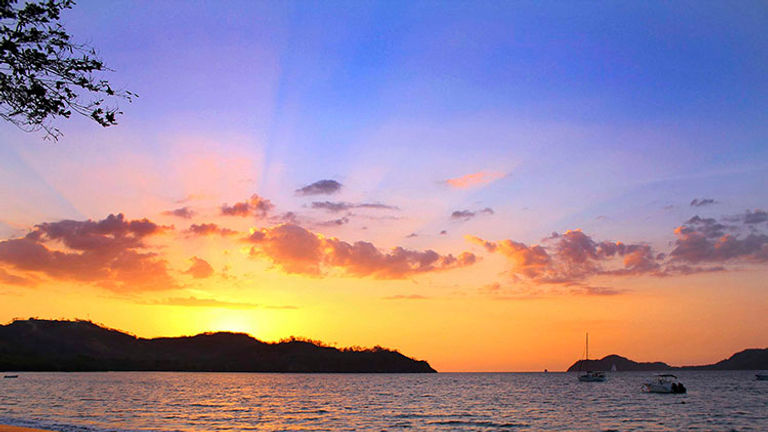 Guests at Guanacaste’s El Mangroove Hotel can catch a stunning sunset on nearby Playa Panama beach. // © 2016 El Mangroove Hotel